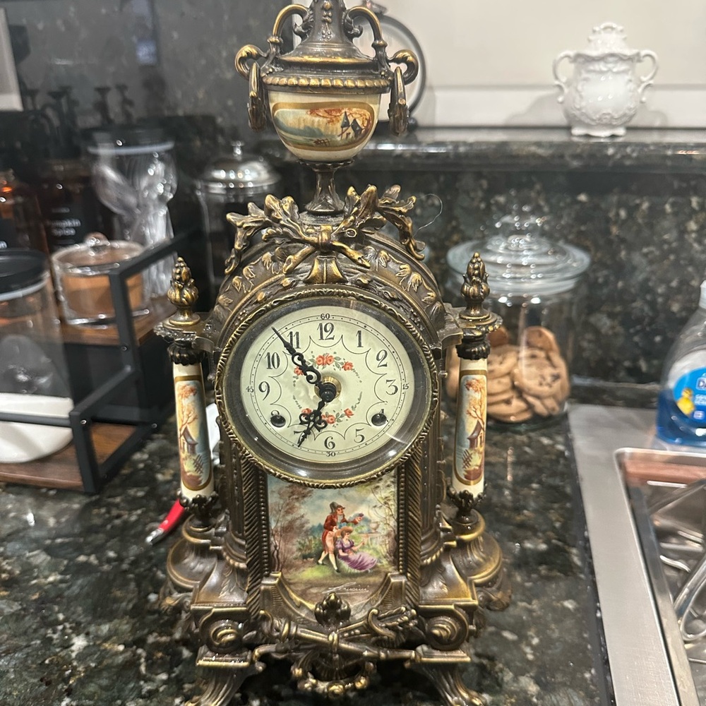 Antique Style Bronze Mantel Clock with Gold Accents